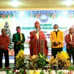 Ketua HKT Kabupaten Merauke, Theo Fatruan sedang memberikan sambutan pada Natal bersama beberapa hari lalu – Surya Papua/Yulianus Bwariat