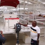 Bupati Merauke, Romanus Mbaraka sedang meninjau peralatan dayung di gudang di sekitar venue – Surya Papua/Frans Kobun