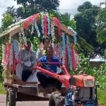 Anggunnya pengantin saat naik traktor menuju ke gereja tadi pagi – Surya Papua/IST