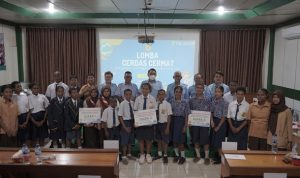 Foto bersama siswa-siswi usai perlombaan bersama managemen TSE Gropu – Surya Papua/ IST