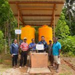 Foto bersama perwakilan masyarakat Kampung Aiwat usai sumur air bersih dirampungkan – Surya Papua/IST