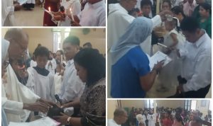 Tiga orang resmi masuk Gereja Katolik serta enam anak dibaptis dalam perayaan misa yang berlangsung di Gereja Katolik Santa Theresia Buti-Merauke – Surya Papua/Frans Kobun