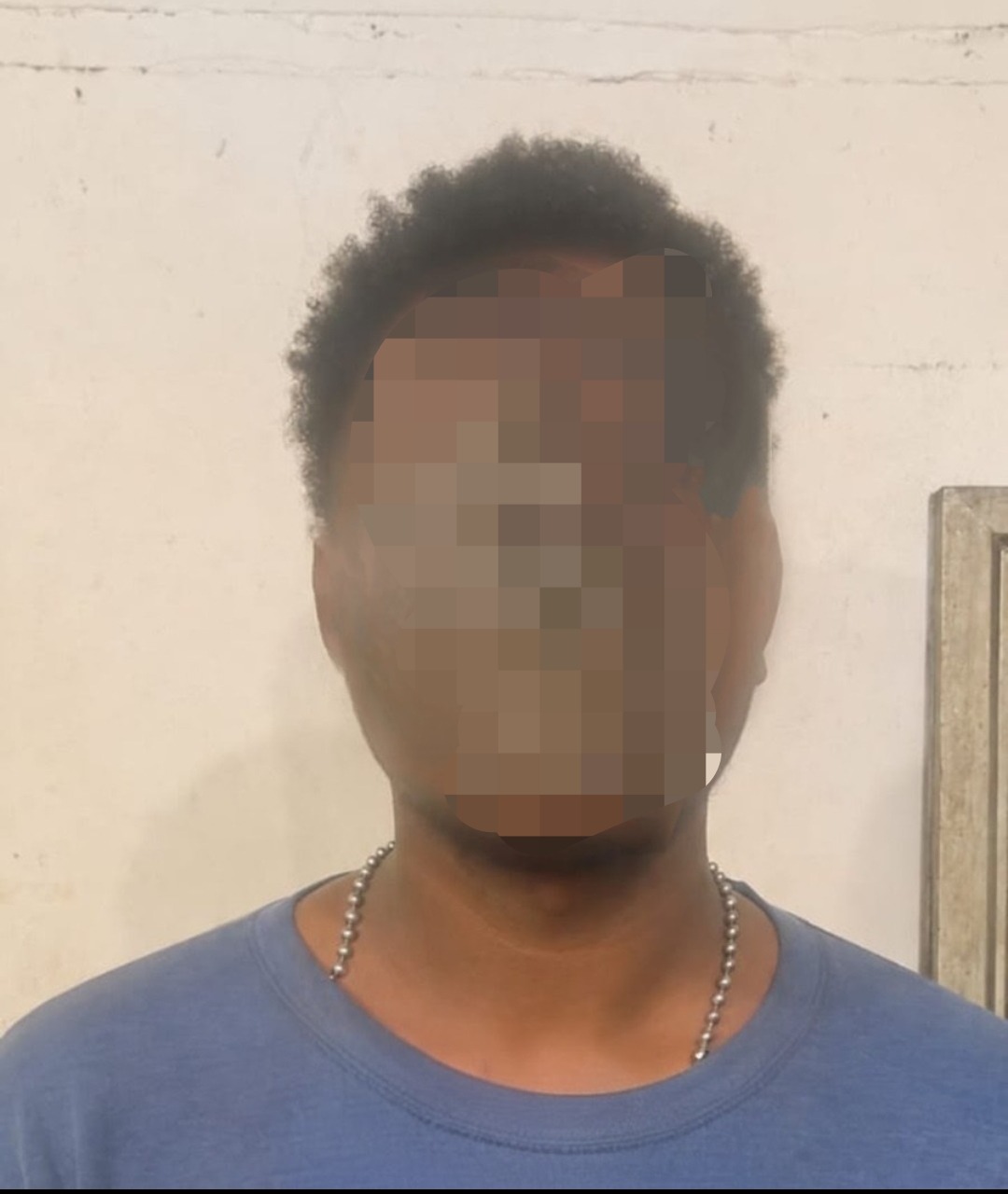 Pelaku penikaman Karlos yang diamankan Satreskrim Polres Merauke – Surya Papua/IST
