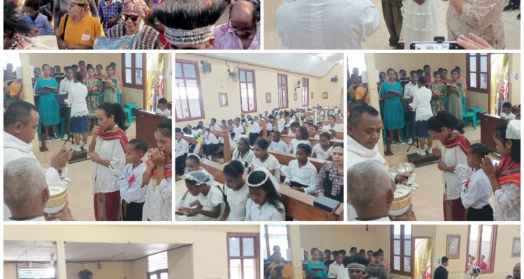 Puluhan anak didampingi orangtuanya pada perayaan misa sekaligus penerimaan sakramen Ekaristi – Surya Papua/Frans Kobun