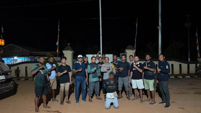 Pelaku yang diamankan Satreskrim Polres Merauke usai melakukan pembunuhan seorang wanita – Surya Papua/IST
