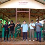 Foto bersama di depan Balai Kampung Rawa Kasat, Distrik Ulilin, Kabupaten Merauke – Surya Papua/IST