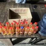 Satresnarkoba Polres Merauke mengamankan belasan botol minuman lokal jenis sopi di Jalan Husein Palela – Surya Papua/IST