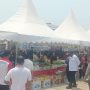 Bupati Merauke, Yoseph Bladib Gebze saat meninjau arena UMKM dalam moment Hari Pangan Sedunia – Surya Papua/Frans Kobun